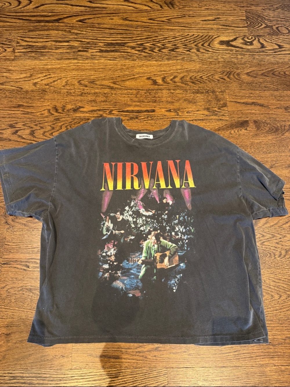 Daydreamer Black Nirvana Graphic Tee with Yellow-Red Logo